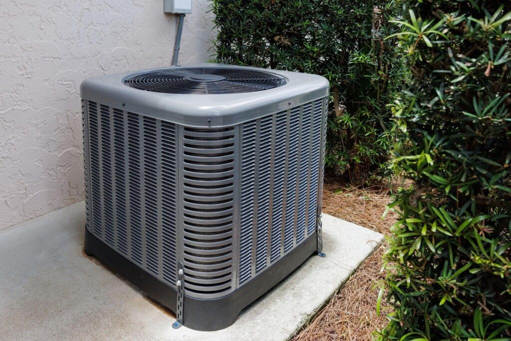 A skilled technician performing air conditioning repair services in Fort Myers, Florida, enhancing indoor comfort