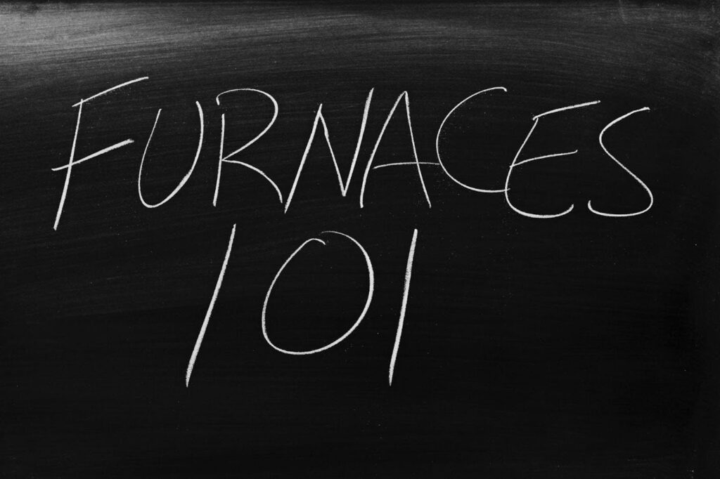 Furnaces 101 is written in white chalk on a blackboard, indicating an introductory course